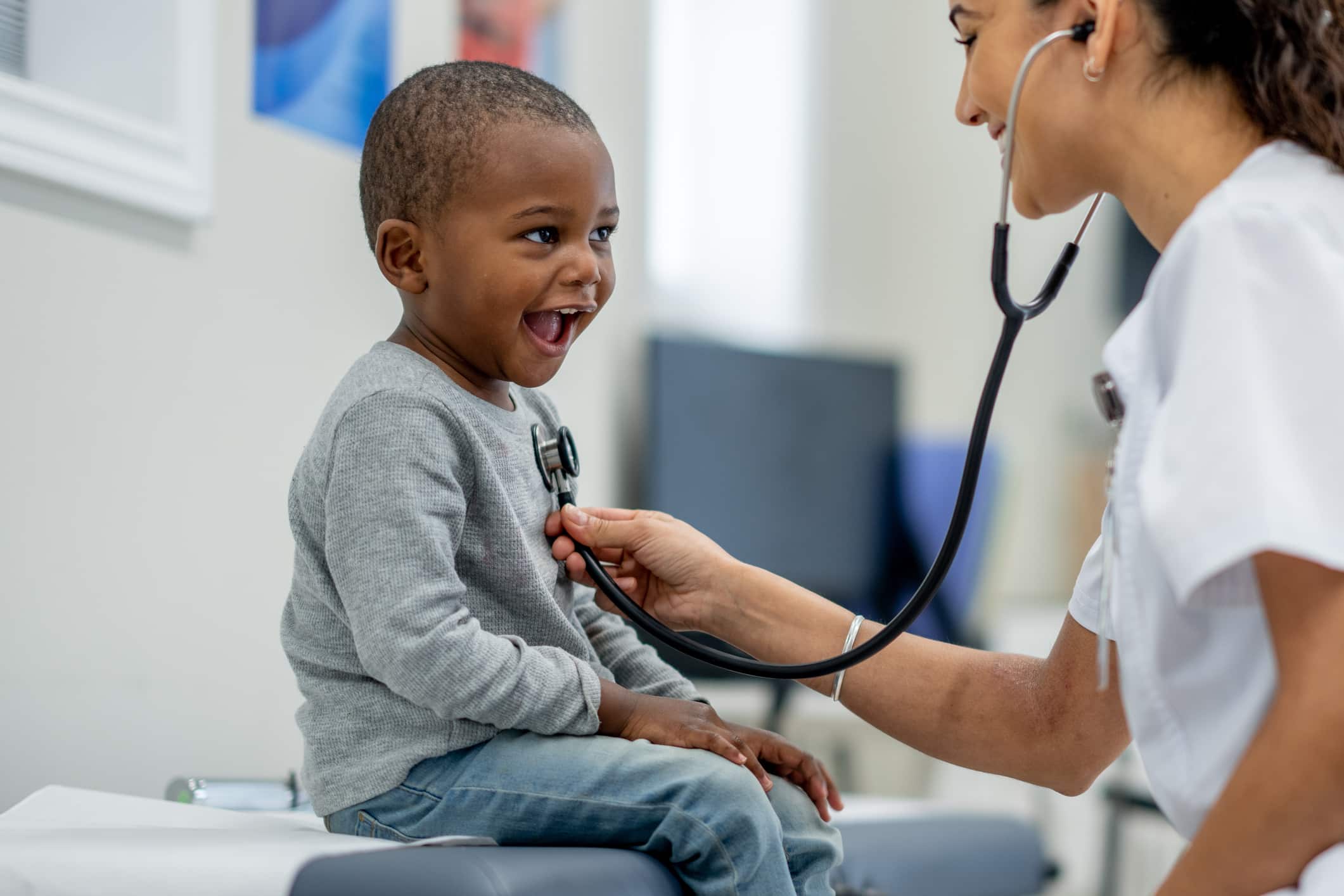 doctor listening to a child's chest